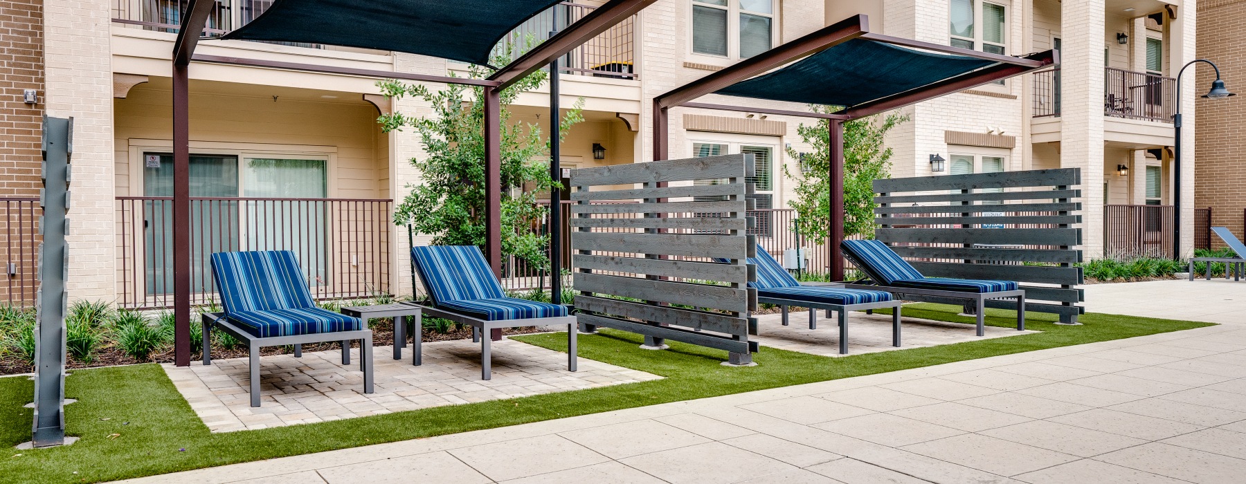 Private chair loungers in the courtyard covered